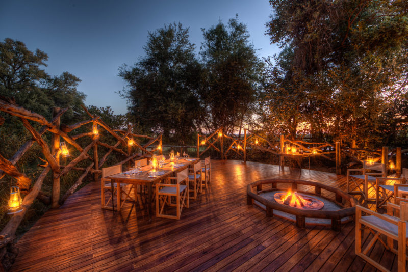 Botswana - Moremi Game Reserve - 1553 - Camp Moremi Main area outside dining at night