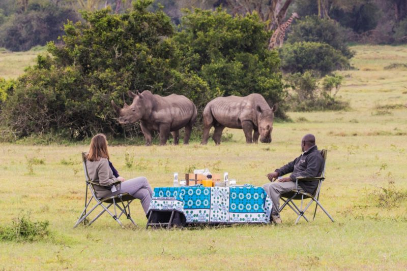 Kenya - 12890 - Solio - Laikipia - Drinks watching Rhino