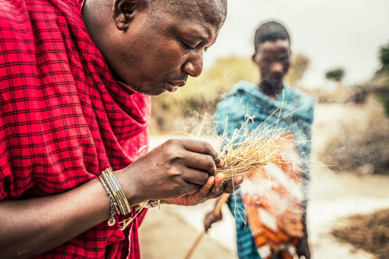 Tanzania - 17467 - Tarangire National Park - Lemala Mpingo Ridge - Maasai Boma - Lighting a fire