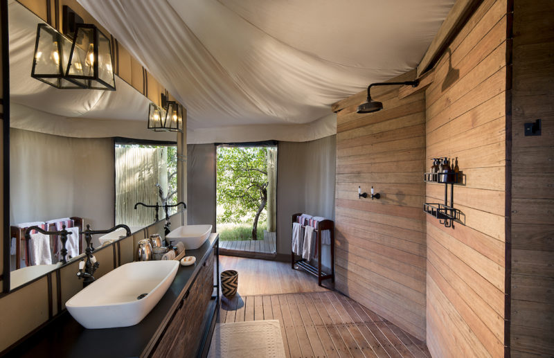 andBeyond Nxabega Okavango Tented Camp - Bathroom